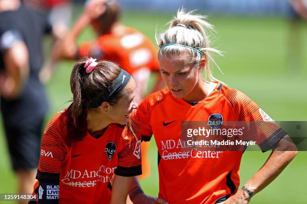 Shea Groom and Rachel Daly of Houston Dash celebrate after defeating the Chicago Red Stars to win the championship game of the NWSL Challenge Cup at...