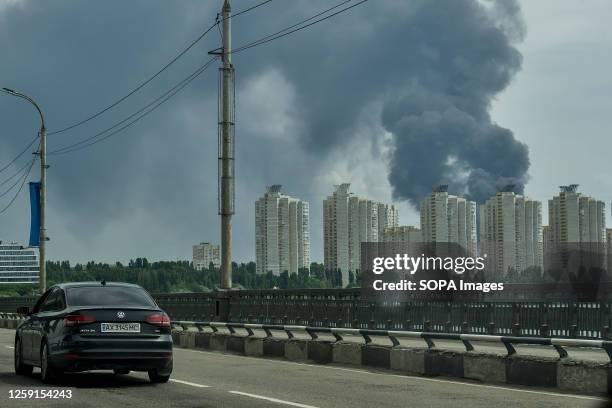 Cloud of smoke is seen in the sky during a fire at an oil depot. A fuel tank was burning at an oil depot in Voronezh, where a hundred firefighters...