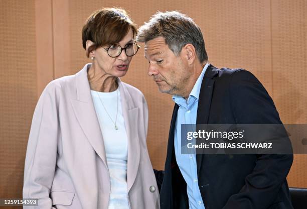 German Minister of Education and Research Bettina Stark-Watzinger and German Minister of Economics and Climate Protection Robert Habeck talk ahead a...