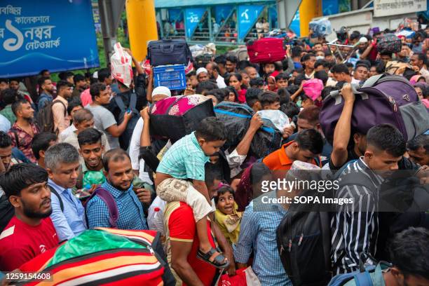 People are seen at a port in Dhaka, leaving the capital to go back to their hometowns to celebrate Eid Al Adha with their families and loved ones....