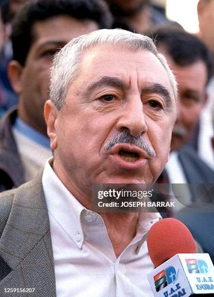 Head of the Democratic Front for the Liberation of Palestine Nayef Hawatmeh talks to reporters before the General National Congress meeting in...