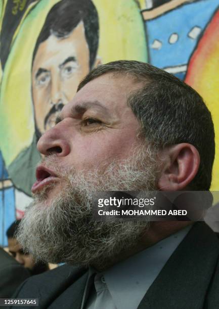 Nafez Azam, an Islamic Jihad leader, speaks during a rally organized by the Palestinian movement's armed wing Saraya al-Quds, or Jerusalem...