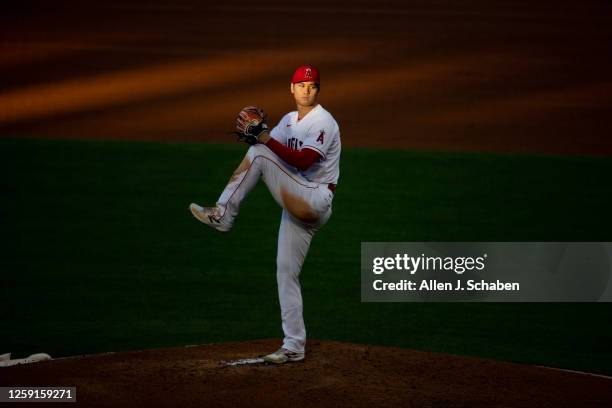 Anaheim, CA Angels starting pitcher Shohei Ohtani delivers a pitch in the fourth nning against the Dodgers at Angel Stadium in Anaheim Wednesday,...