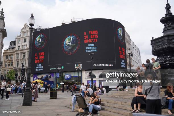 The National Climate Clock at the Piccadilly Lights in central London, part of London Climate Action Week. Picture date: Wednesday June 28, 2023.