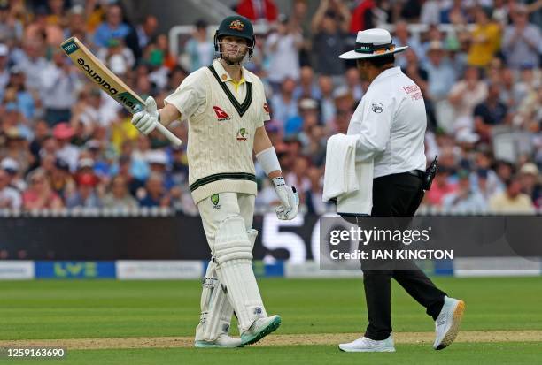 Australia's Steven Smith celebrates his half-century on day one of the second Ashes cricket Test match between England and Australia at Lord's...