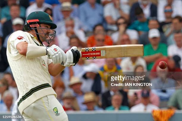 Australia's Travis Head plays a shot on day one of the second Ashes cricket Test match between England and Australia at Lord's cricket ground in...