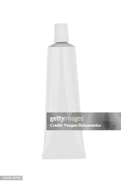 aluminium cream tube with clipping path isolated on white background - toothpaste stock-fotos und bilder