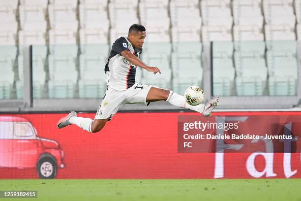 Alex Sandro of Juventus controls the ball during the Serie A match between Juventus and UC Sampdoria at Allianz Stadium on July 26, 2020 in Turin,...