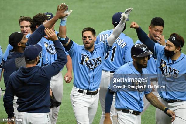 Kevin Kiermaier of the Tampa Bay Rays reacts after hitting a game winning triple to defeat the Toronto Blue Jays 6-5 in the 10th inning at Tropicana...