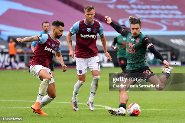 Jack Grealish of Aston Villa scores the first goal during the Premier League match between West Ham United and Aston Villa at London Stadium on July...