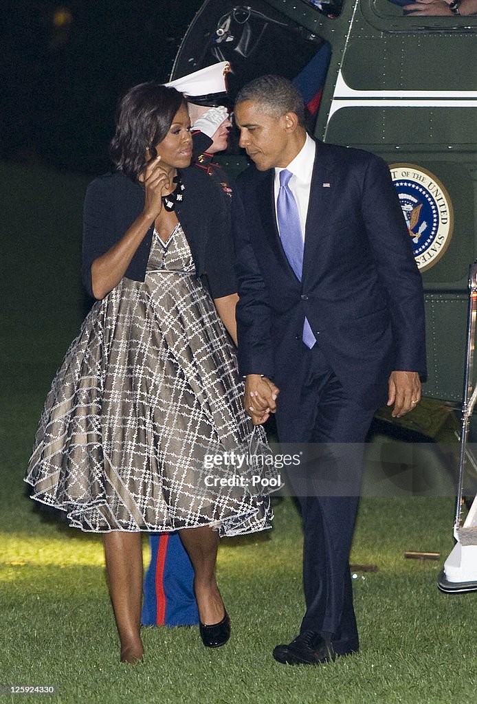 President Obama, First Lady Return To Washington