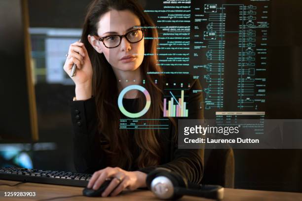 data dark office woman - scrutiny stock pictures, royalty-free photos & images
