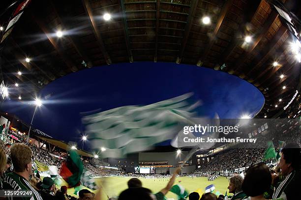 Supporters of the Portland Timbers wave flags against the San Jose Earthquakes on September 21, 2011 at Jeld-Wen Field in Portland, Oregon.