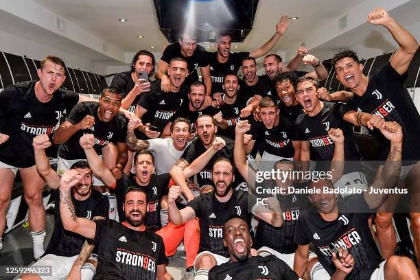 Juventus FC players celebrate in the dressing room after the winning of the Italian championship "scudetto" 2019-2020 after the Serie A match between...