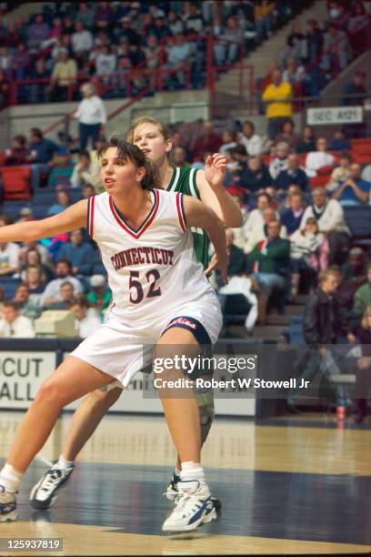 University of Connecticut center Kara Wolters posts up during a play against Michigan State, while playing in a game at Gampel Pavilion in Storrs,...