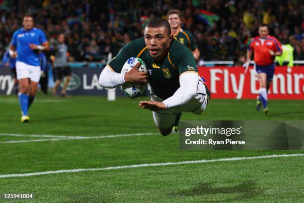 Bryan Habana of South Africa goes over to score their second try during the IRB 2011 Rugby World Cup Pool B match between South Africa and Namibia at...