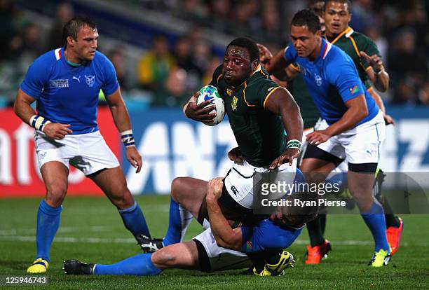 Tendai Mtawarira of South Africa is tackled during the IRB 2011 Rugby World Cup Pool B match between South Africa and Namibia at North Harbour...