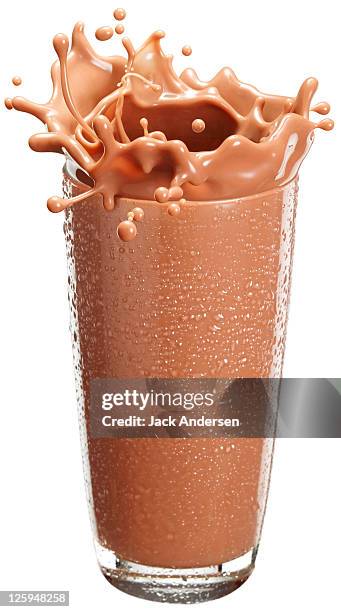 glass of milk splash - chocolate milkshake stock pictures, royalty-free photos & images