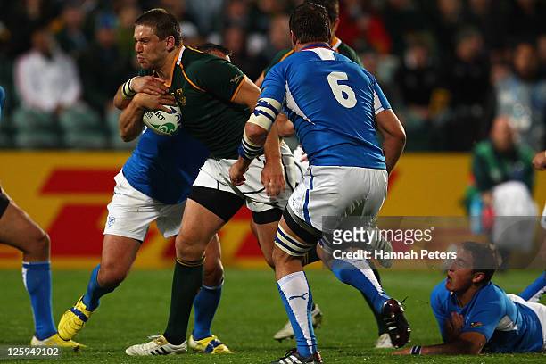 Frans Steyn of South Africa tries to make his way through the Namibia defense during the IRB 2011 Rugby World Cup Pool B match between South Africa...