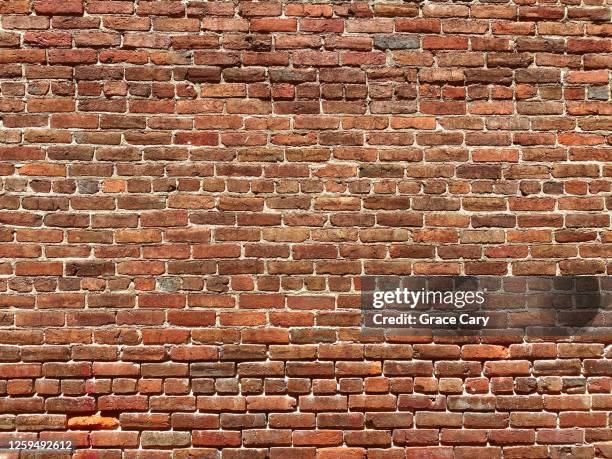 brick wall - ziegelmauer stock-fotos und bilder