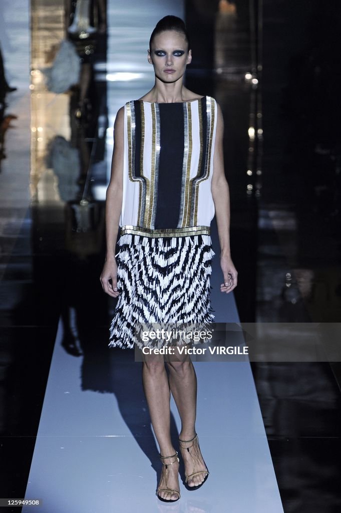 Gucci 2012 Spring Collection A model walks the runway at the Gucci Spring/Summer 2012 fashion show ...
