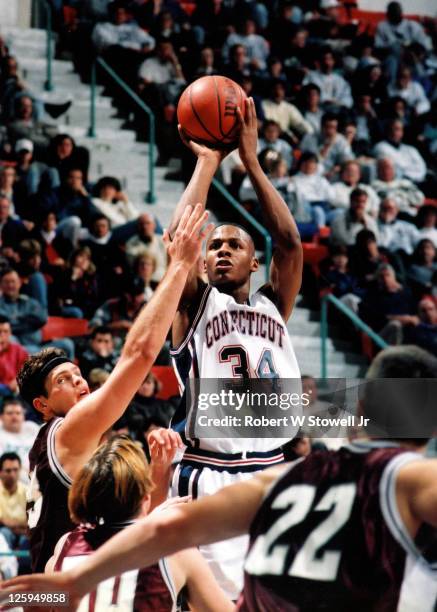 UConn's Ray Allen shoots over defense, Hartford, CT 1994.