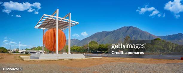 panoramic view of soto sphere with avila mountain at the background. la esfera de soto - caracas stock pictures, royalty-free photos & images