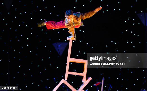 Acrobat Paul O'Keefe balances on the end of a chair as Circus Oz, the Australian cultural icon, launches a new season to celebrate its 30th birthday...