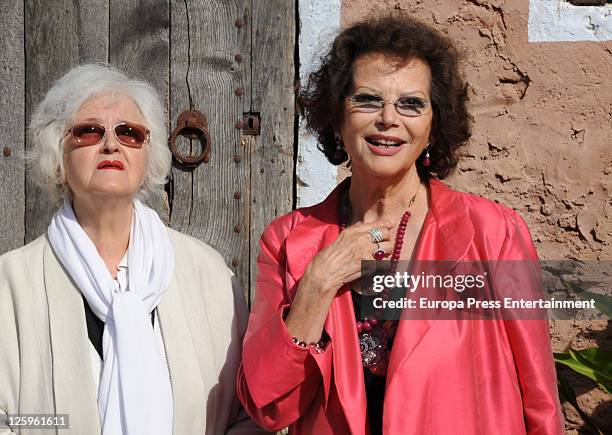 Chus Lampreave and Claudia Cardinale pose during 'El artista y la modelo' in Batet de la Serra on September 21, 2011 in Olot, Spain.