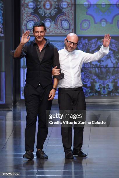 Designers Stefano Gabbana and Domenico Dolce acknowledge the audience at the end of the last D&G fashion show as part of Milan Fashion Week...