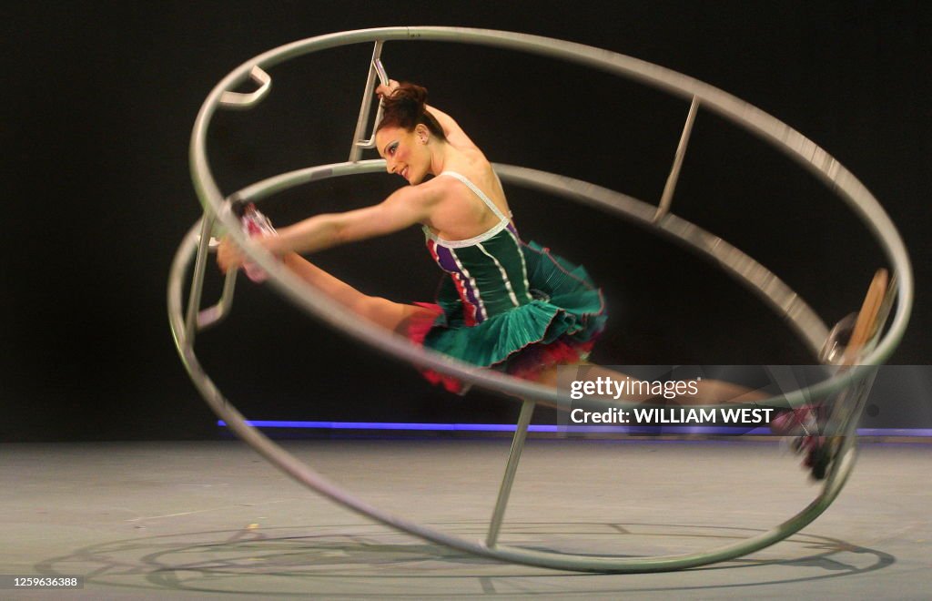 Circus Graduation Brittany Mercer performs on her giant wheel as she prepares for her ...