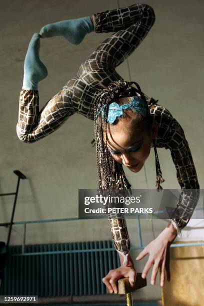 Contortionists 907 Female Contortionists Stock Photos, High-Res Pictures, and Images ...