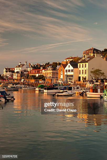 dawn light on st aubins harbour, st aubins, jersey, channel islands - jersey england stock pictures, royalty-free photos & images