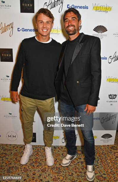 Danish tennis player Holger Rune and French tennis player Jérémy Chardy attend Wimby Wednesday hosted by The Aubrey at Mandarin Oriental Hyde Park on...