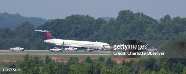 Delta Airlines plane sits on a runway at Charlotte Douglas International Airport in Charlotte, NC on Wednesday, June 28, 2023 after it landed without...