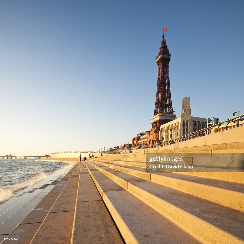 Blackpool Tower, created and built by Charles Tuke and James Maxwell, on Blackpool Beach, Blackpool, Lancashire, England, UK