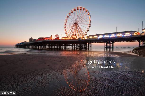 ferris wheel on the central pier made in 1868 by john isaac mawson on blackpool beach, blackpool, lancashire, england, uk - blackpool stock pictures, royalty-free photos & images