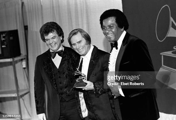 Conway Twitty, George Jones and Charley Pride at the 1981 Grammy Awards at Radio City Music Hall in New York City on February 25, 1981.