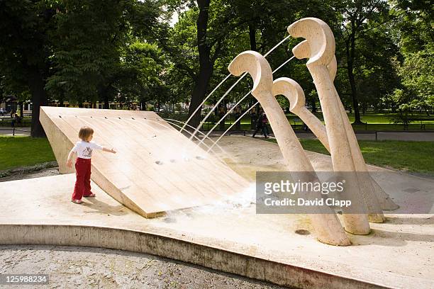 fountain that remembers chopin; jets of water come from piano keys, planty park, old town, krakow, poland - krakow park stock pictures, royalty-free photos & images