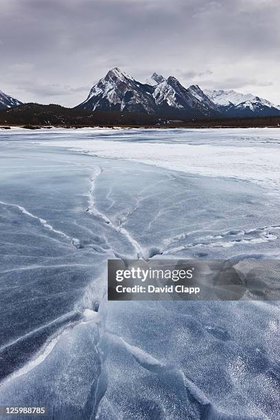 lifted ice plates on frozen river on kootenay plains, abraham lake, canadian rockies, alberta, canada (16th february 2010) - broken ice stock pictures, royalty-free photos & images