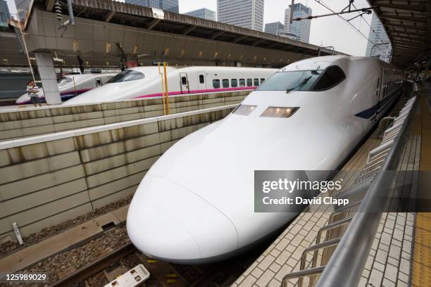 nozomi-style bullet train in kyoto railway station, japan - high speed train stock pictures, royalty-free photos & images