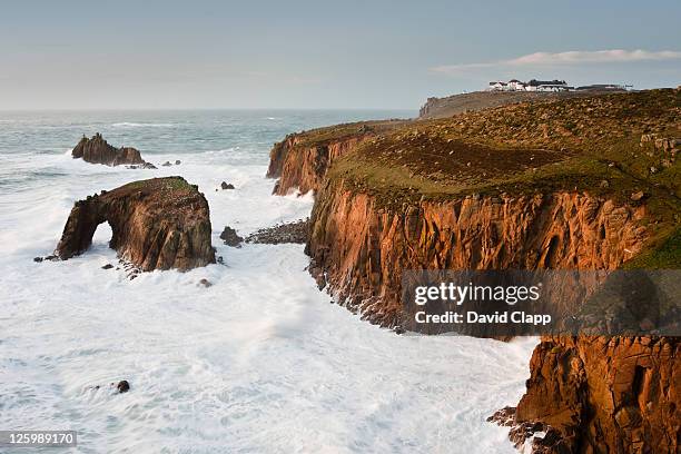 stormy seas at lands end, cornwall, england, uk - david cliff stock pictures, royalty-free photos & images