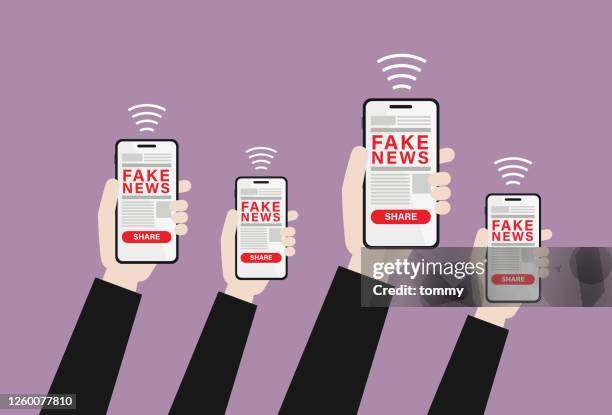 ilustraciones, imágenes clip art, dibujos animados e iconos de stock de mano sosteniendo noticias falsas en un teléfono móvil - falso