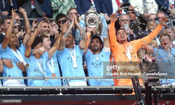 Manchester City's Ilkay Gundogan lifts the trophy during the The Emirates FA Cup Final match between Manchester City and Manchester United at Wembley...