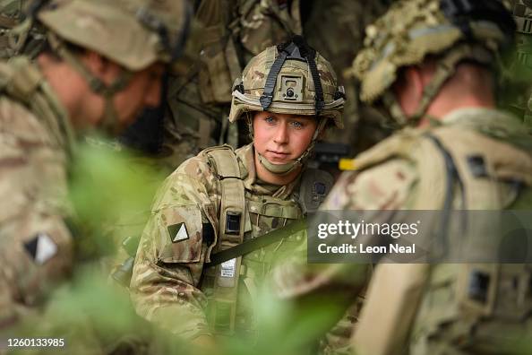 Reconnaissance Tasks A soldier from the Long Range Reconnaissance Task Group prepares to ...
