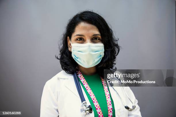 Studio portrait of female doctor