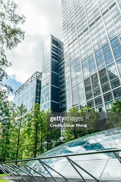 business towers in the financial district of london - business park uk stock pictures, royalty-free photos & images