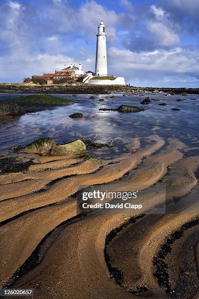 st mary's lighthouse with sand patterns, whitley bay, newcastle, uk - tyne and wear stock pictures, royalty-free photos & images