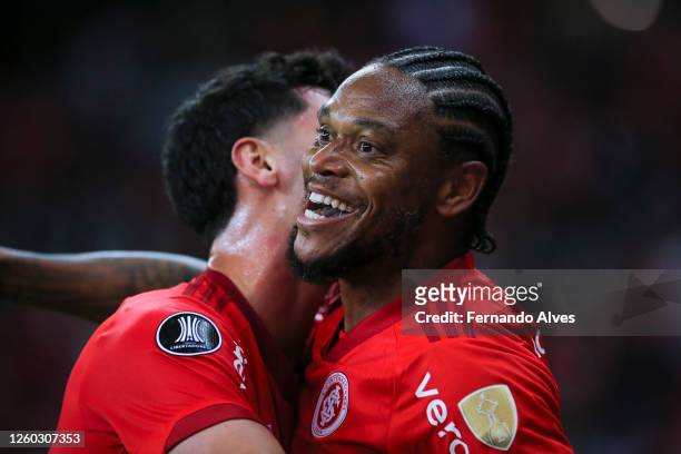 Luiz Adriano of Internacional celebrates after scoring the team's second goal during the group B match between Internacional and Independiente...