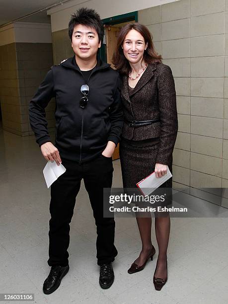 Pianist Lang Lang and Lang Lang International Music Foundation Executive Director Jodi Hyde visit PS 334 - The Anderson School on January 3, 2011 in...